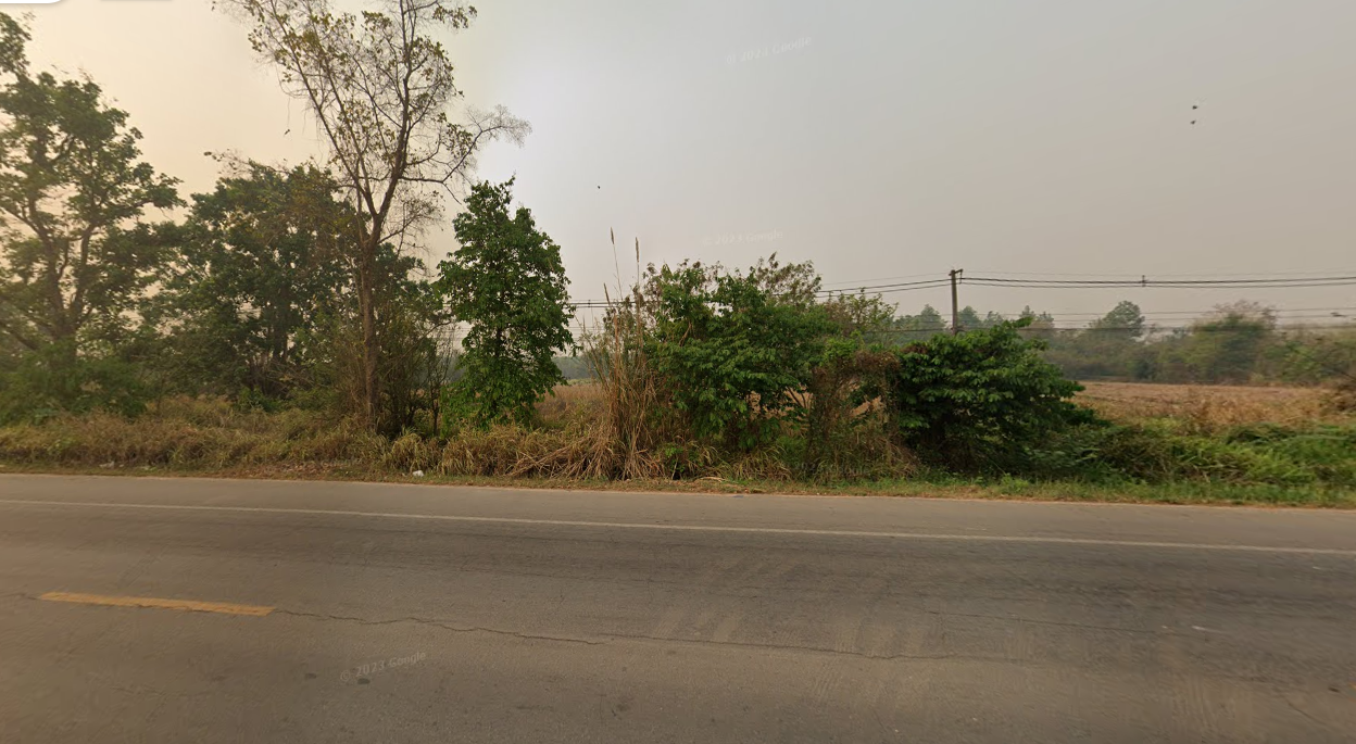 ขายที่ดินเชียงราย อำเภอแม่ลาว ที่ดินหน้ากว้าง ทำเลดี ติดถนนเชียงราย-เชียงใหม่ 11-3-72 ไร่.