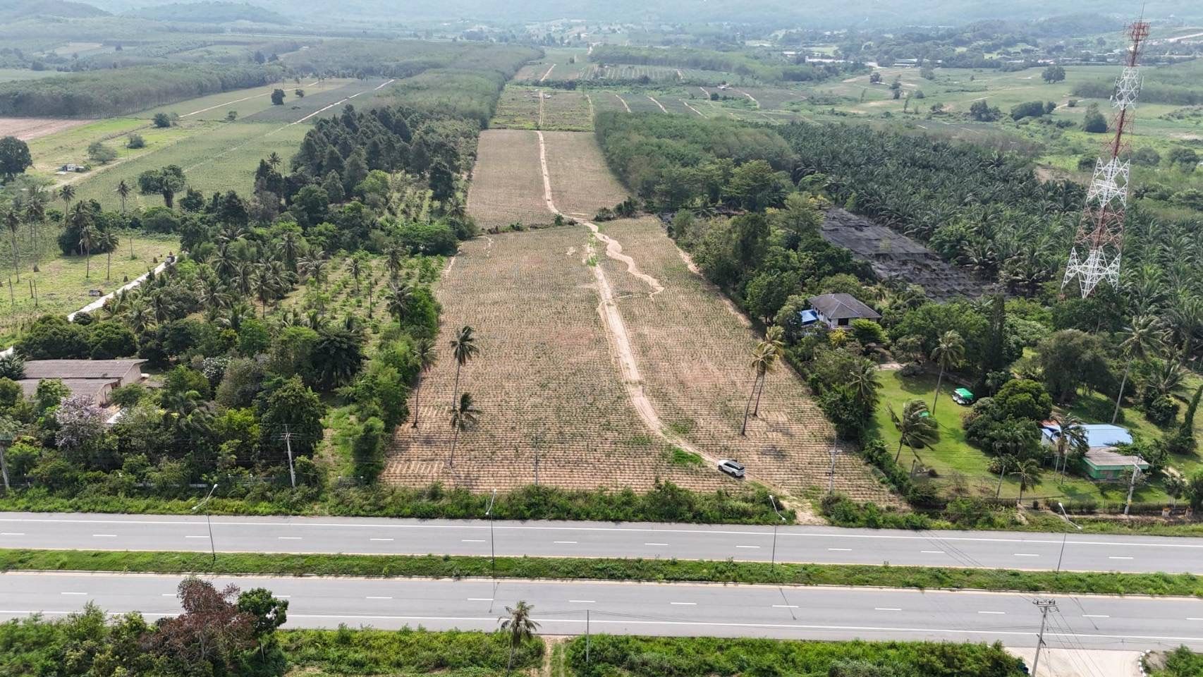 ขายที่ดินเปล่า ติดถนน 4 เลน นิคมพัฒนา ซ.13 